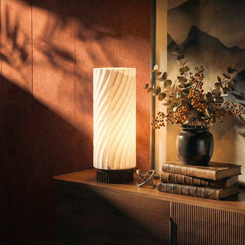 Kuro Design Mizuki lamp on desk creating soft warm light for focused work