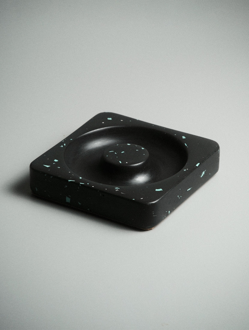 Ash Orbit Jesmonite dish with incense on a calm workspace desk setup — Kuro Design