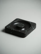 Ash Orbit Jesmonite dish with incense on a calm workspace desk setup — Kuro Design