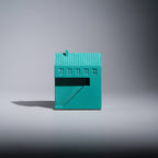 Kaidan Paperweight side view, Jesmonite house-shaped paperweight with roofline and chimney, Kuro Design