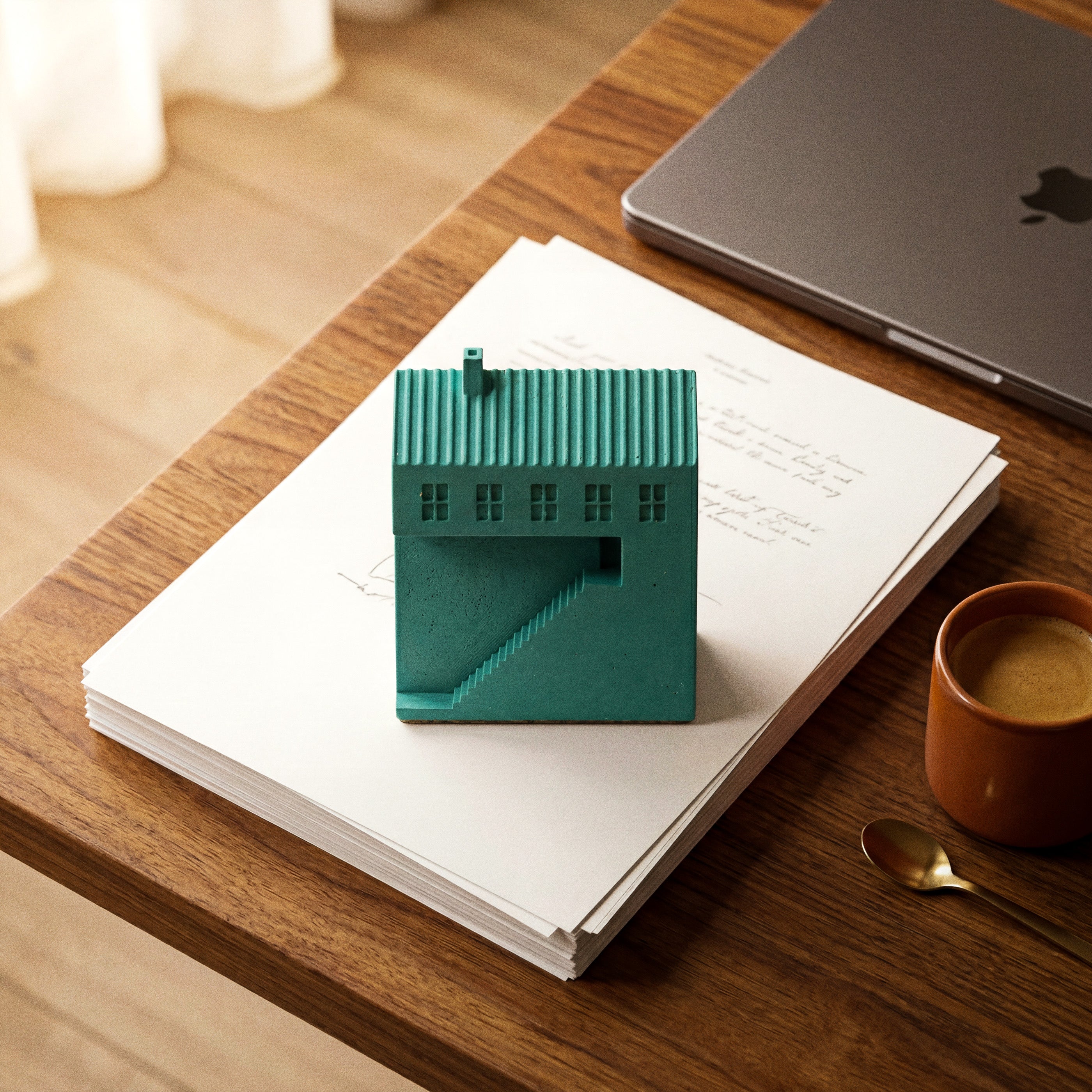 Kaidan Paperweight by Kuro Design, Jesmonite house with a diagonal staircase and open cutout, Architecture Series