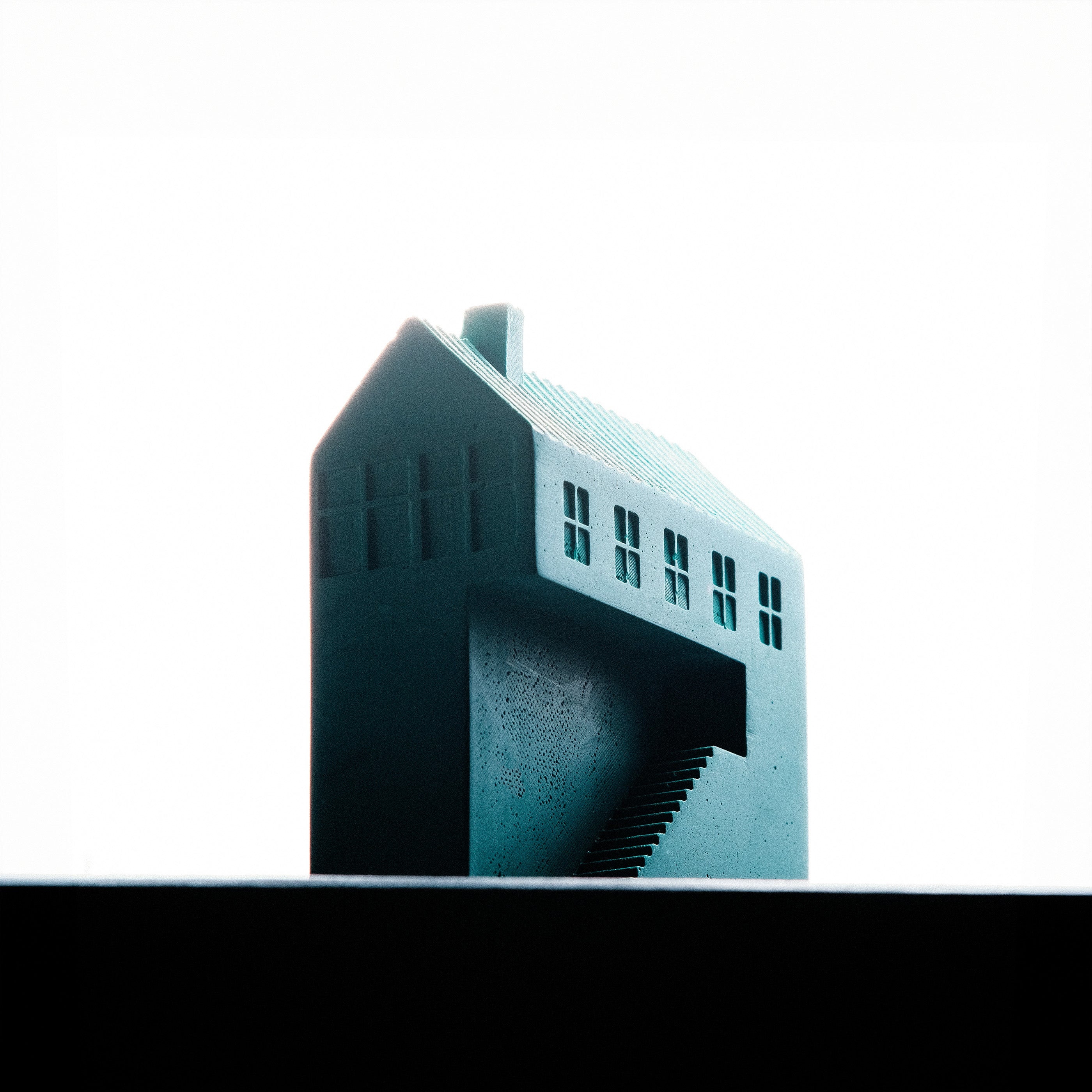 Kaidan Paperweight, Jesmonite house-shaped paperweight with staircase and window details, Kuro Design