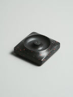 Kuro Design Kaze Incense Holder in black and red terrazzo variant — Jesmonite