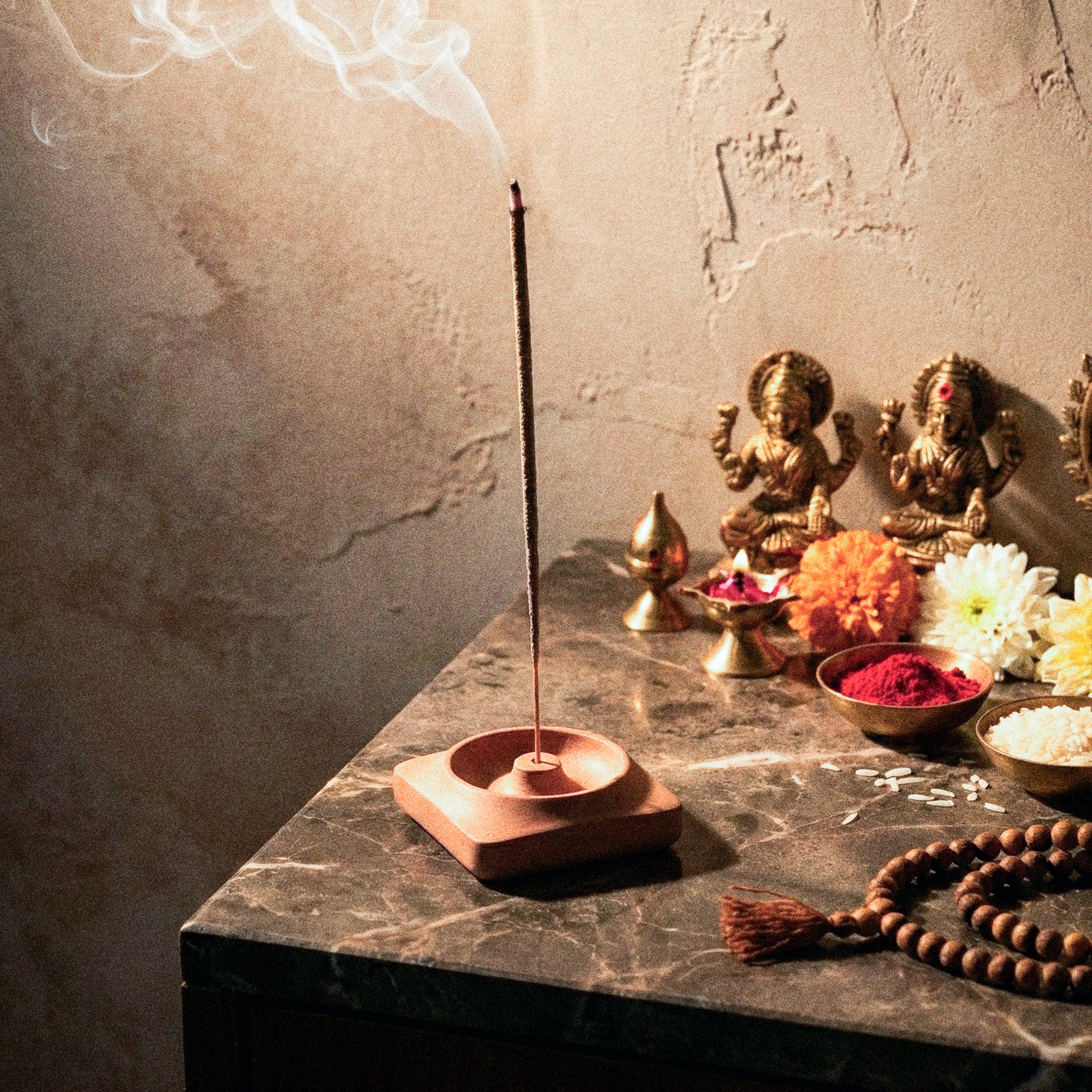 Kaze Incense Holder by Kuro Design with incense burning on a calm minimal desk