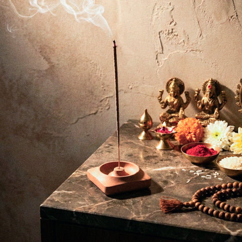 Kaze Incense Holder by Kuro Design with incense burning on a calm minimal desk