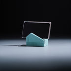 Koya Card Stand by Kuro Design holding business cards at a natural angle, minimal Jesmonite desk accessory made in India