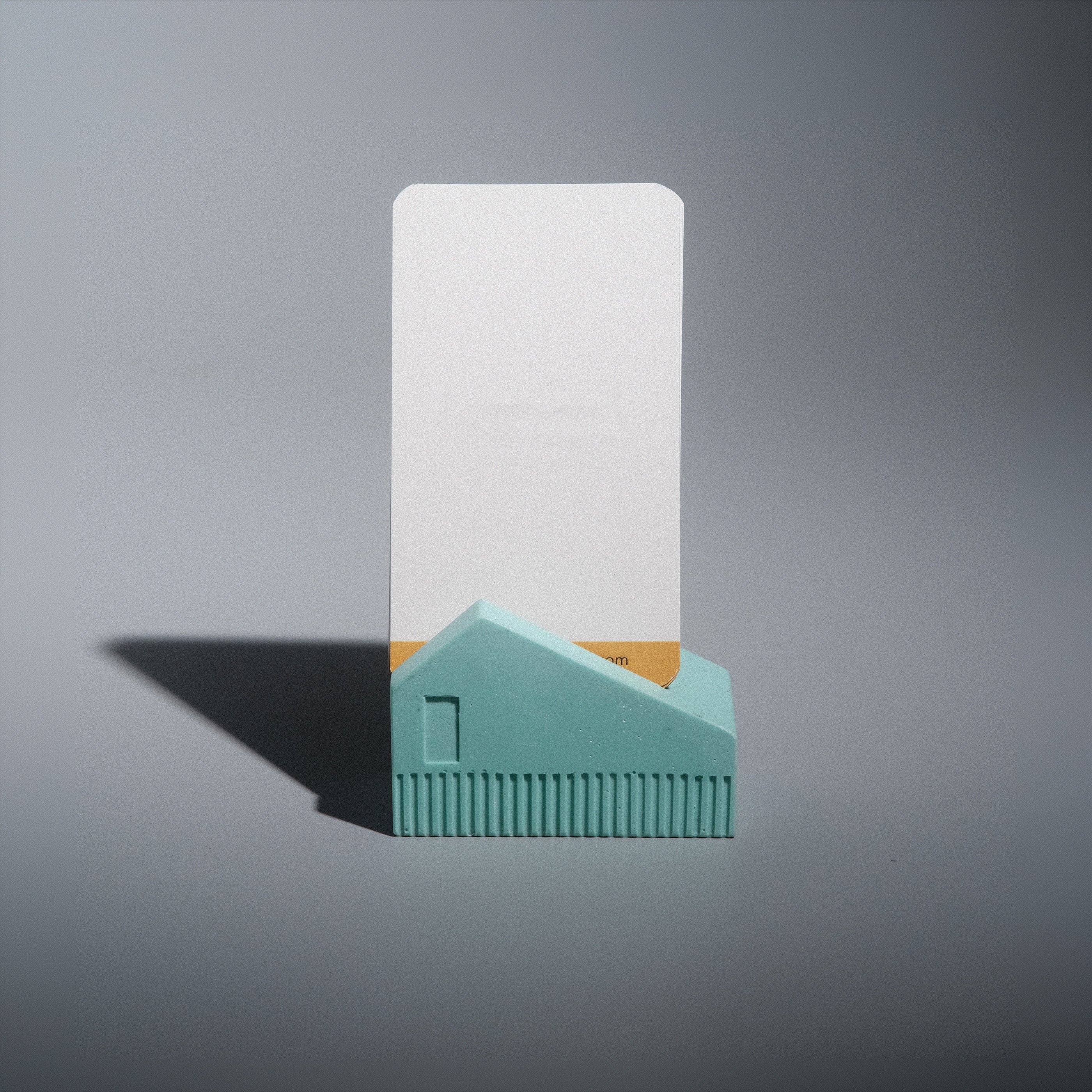 Koya Card Stand detail, ribbed base and window cutout in hand-cast Jesmonite, handcrafted by Kuro Design Gurgaon