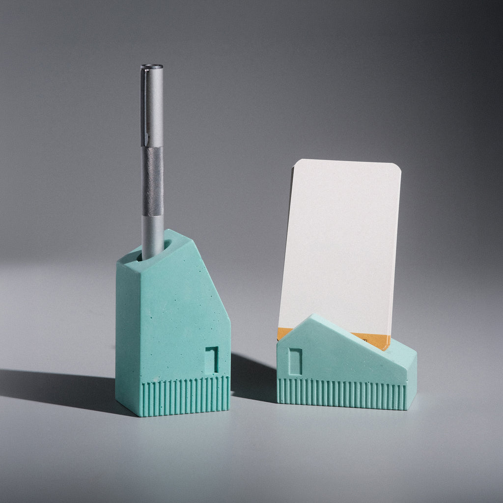 Kuro Design Koya Pen and Card Stand set, two handcrafted Jesmonite houses that hold a pen and business cards