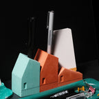 Kuro Design Koya Pen Stand in terracotta, a handcrafted Jesmonite pen holder shaped like a small house, Architecture Series