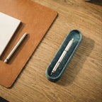 Linea Pen Tray by Kuro Design holding pens on a clean minimal desk setup