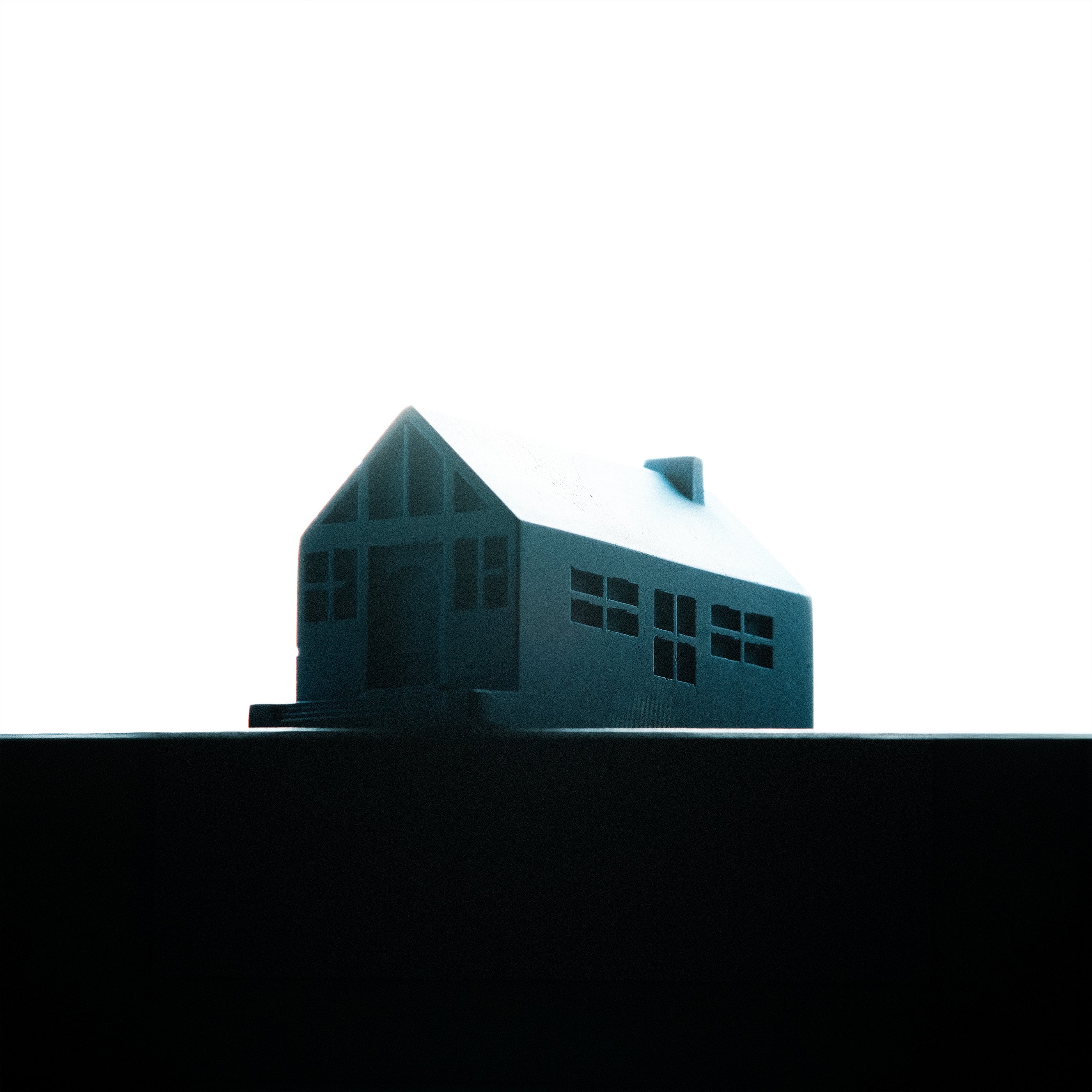 Kuro Design Mado Paperweight, a wide handcrafted Jesmonite house-shaped paperweight, Architecture Series